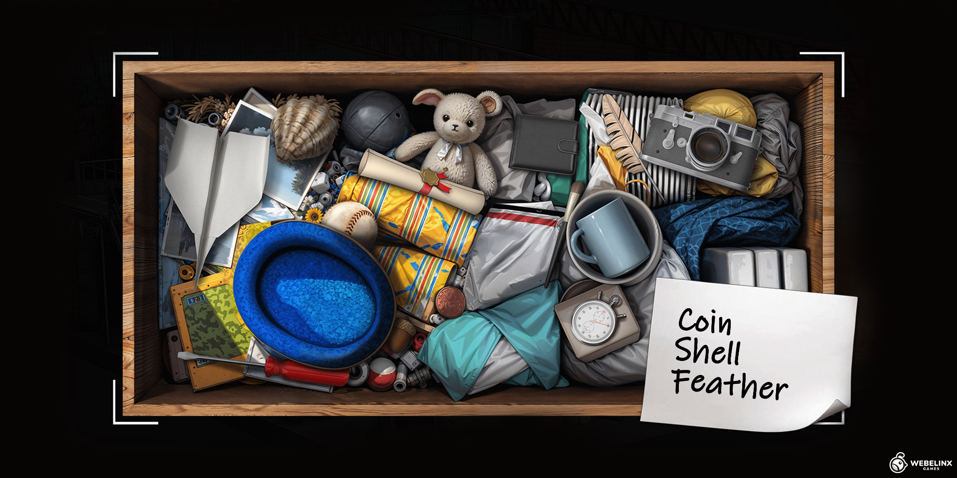 Wooden box filled with assorted objects and clue note